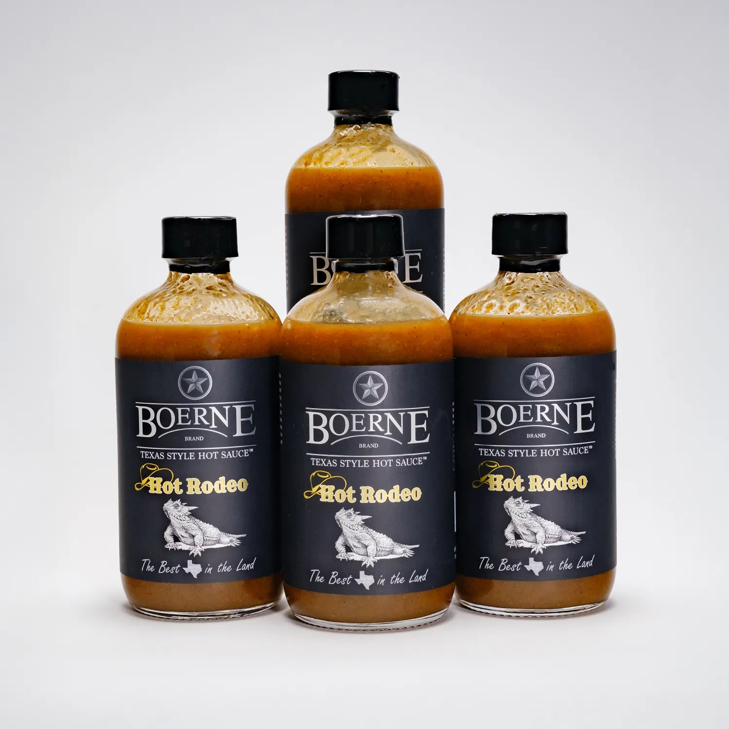 Boerne Brand Hot Rodeo smoky Texas-style hot sauce bottle lineup
