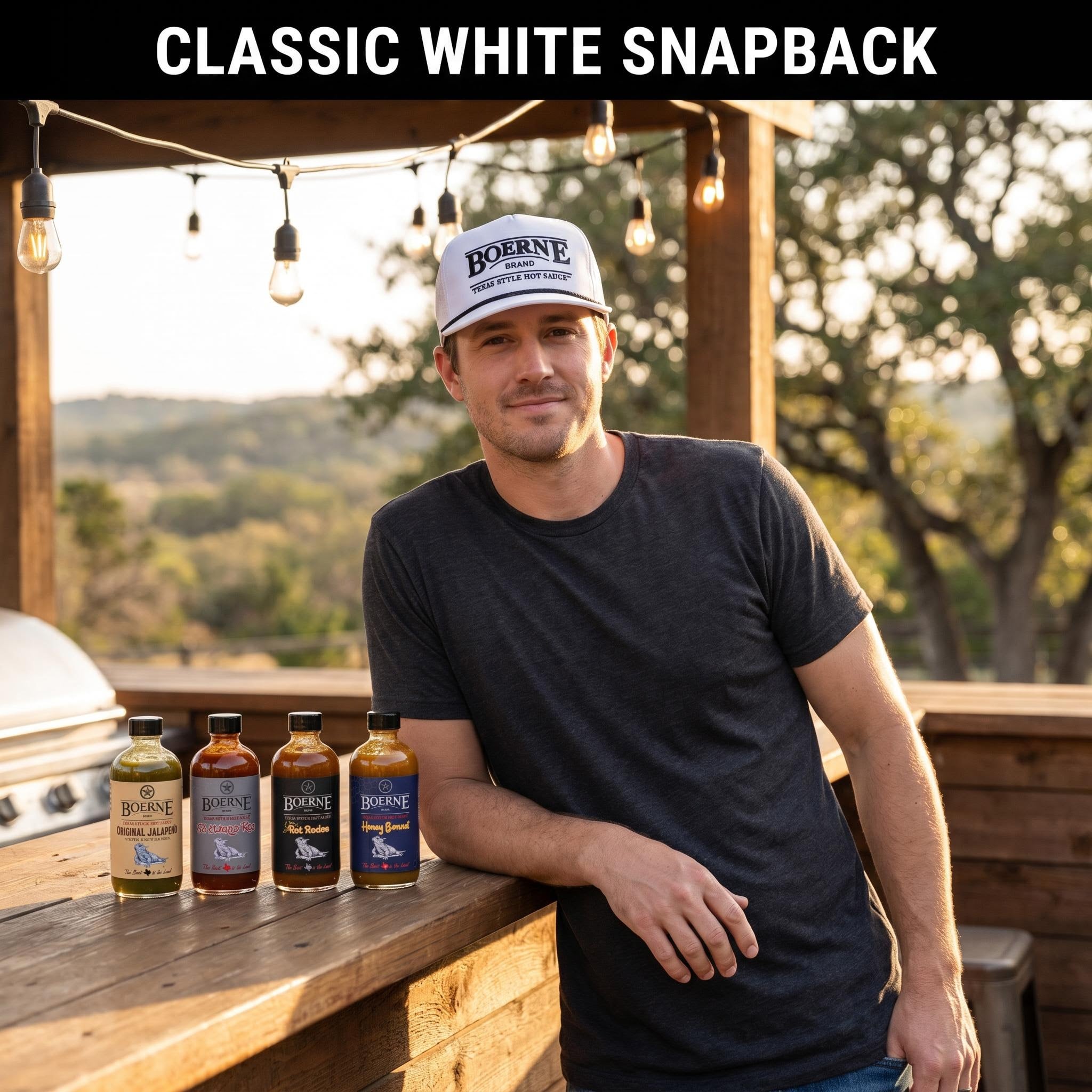 Classic White Snapback — Boerne Brand Texas Gift Box lifestyle, four 8oz bottles on Texas patio